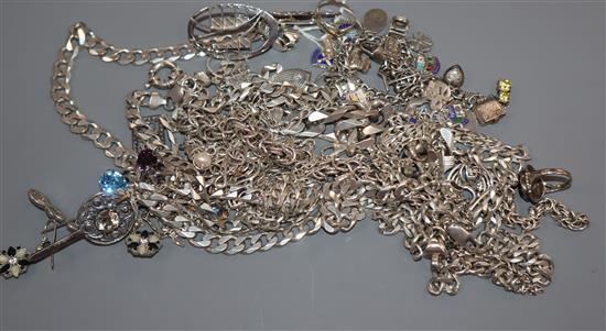 A group of assorted silver and white metal jewellery including curblink necklaces and bracelets.
